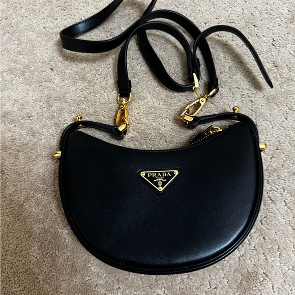 Prad Black Crossbody Bag with Gold Accents - Picture 1 of 3